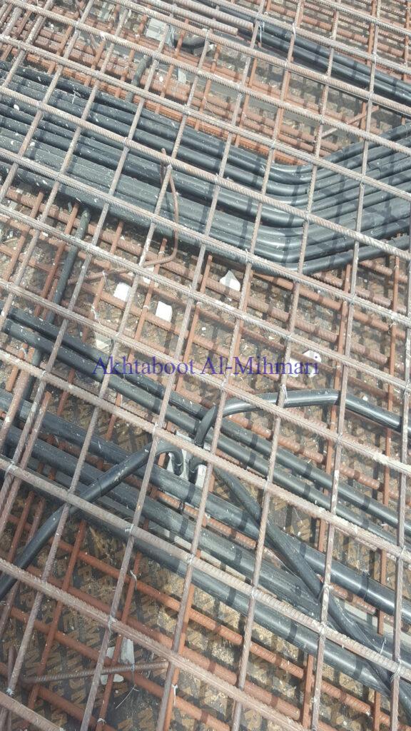 PVC Pipes for Electrical cable distribution inside reinforcement concrete slabe before pouring concrete: Building Electrical Systems Done Right: Choose Akhtaboot Al Mihmari, your trusted contractor for electrical works.